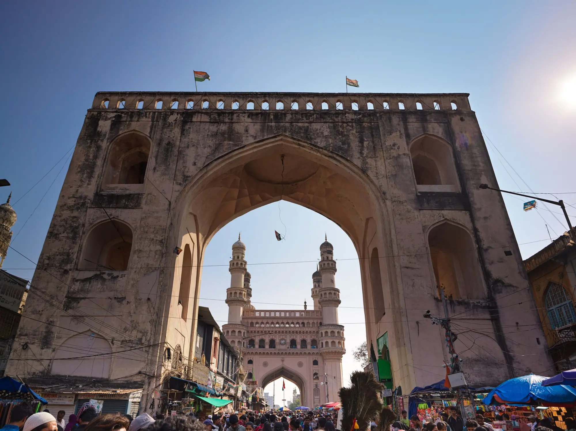 Charminar seen through an arch of the Old City market in Hyderabad